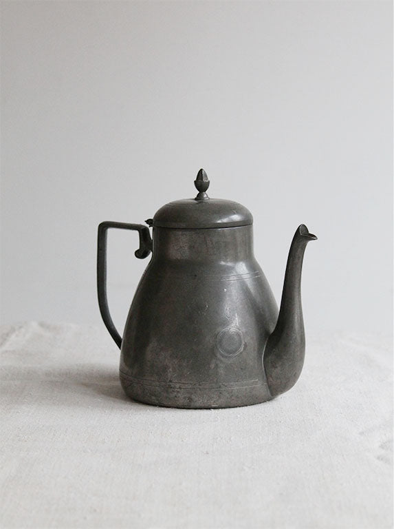 Vintage Pewter Teapot on Table